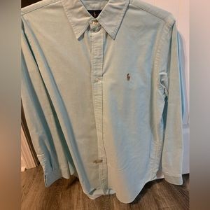 Blue polo shirt.